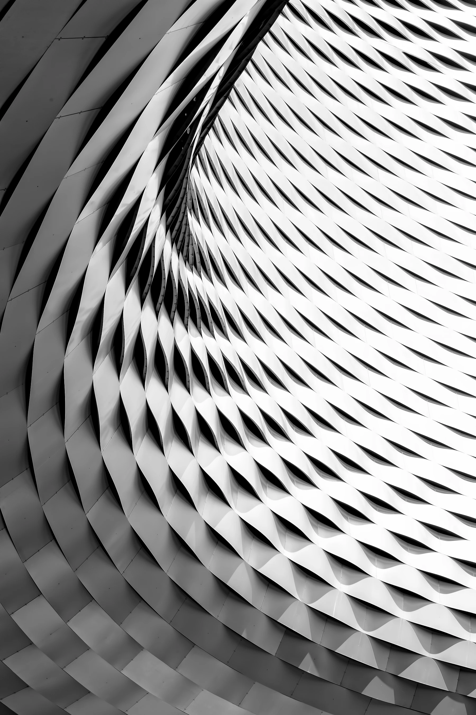 Curved facade with white latticework