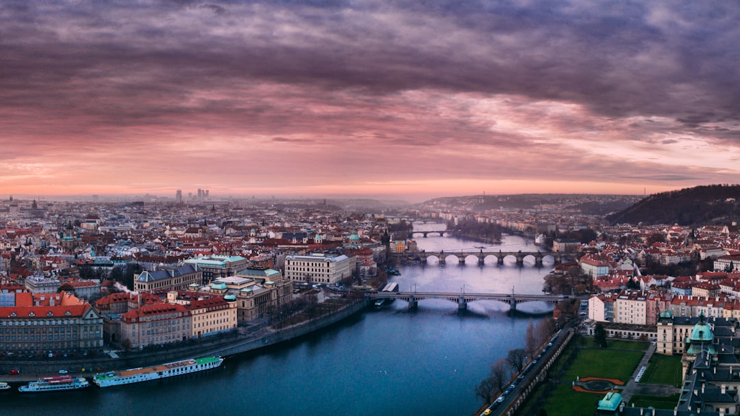 aerial photography of city under cloudy sky