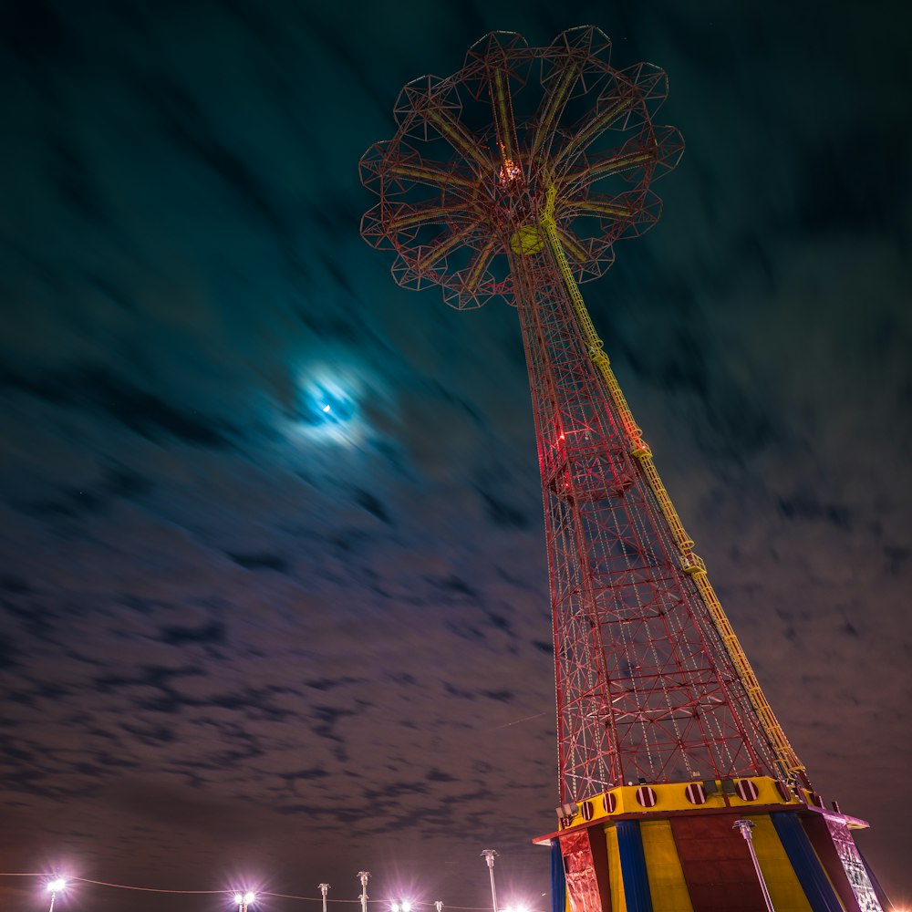 worm's eye view of red and yellow tower