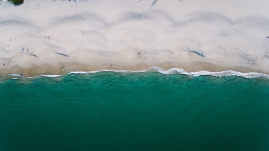 gray sand next to beach in Nelson Bay Australia