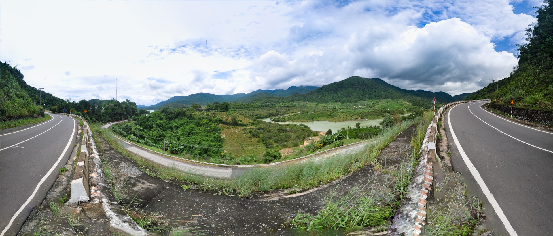 woman wearing yellow long-sleeved dress under white clouds and blue sky during daytime