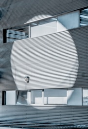 gray painted building wall