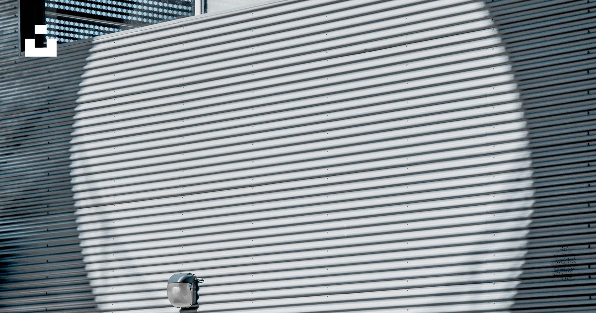 Gray painted building wall photo – Free Grey Image on Unsplash