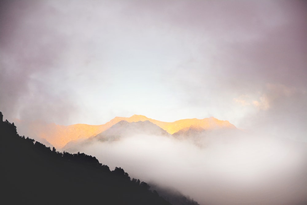 mountains surrounded by clouds