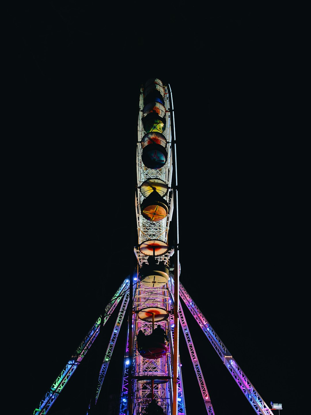lighted Ferris wheel during nighttime
