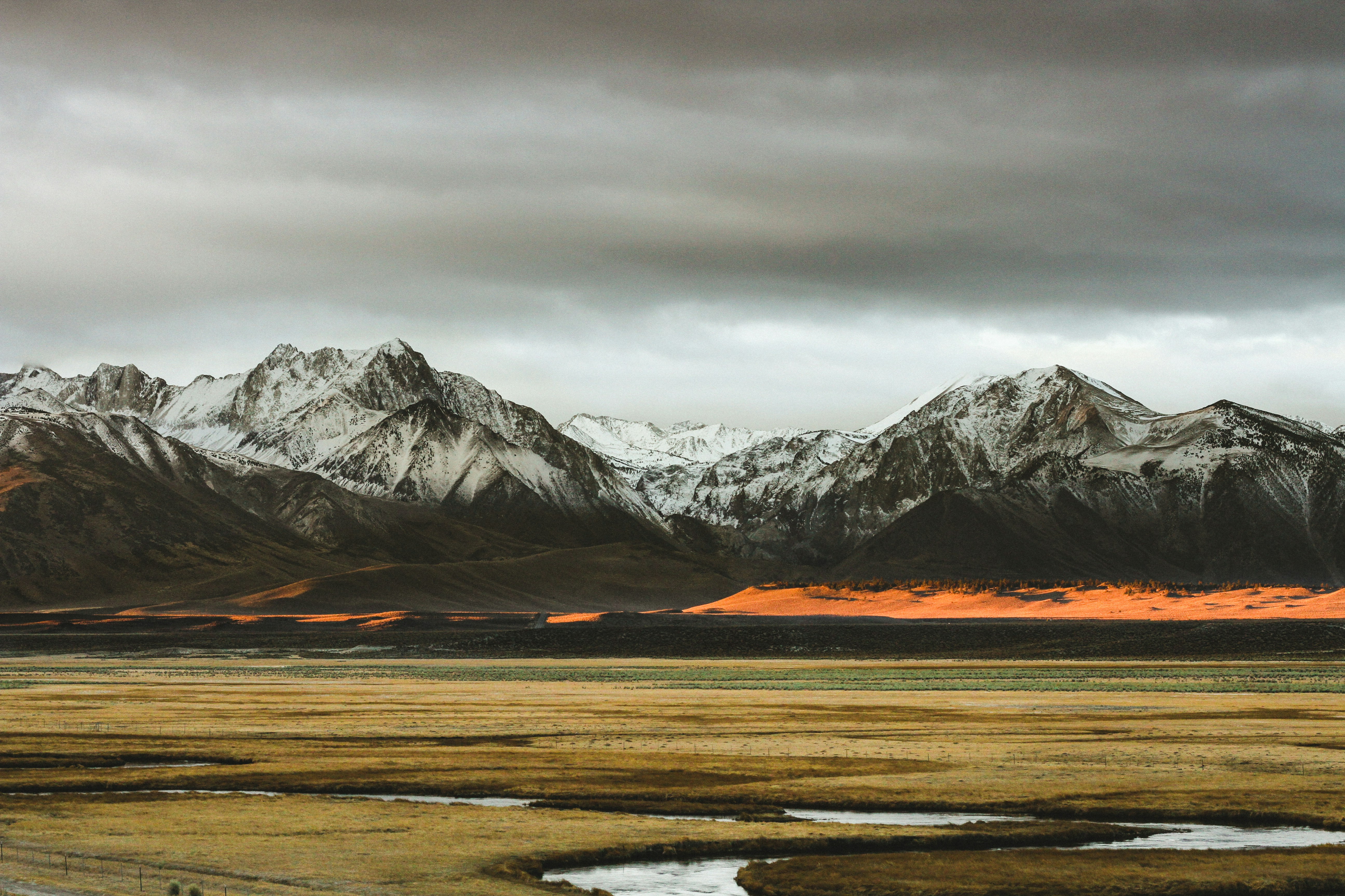snow covered mountain, Clouds gathering over snowy mountains