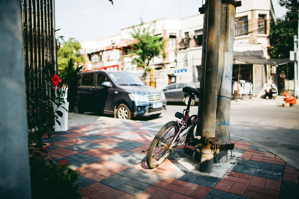 photo of bike parked on post