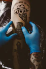 fortune and glory tattoo on arm
