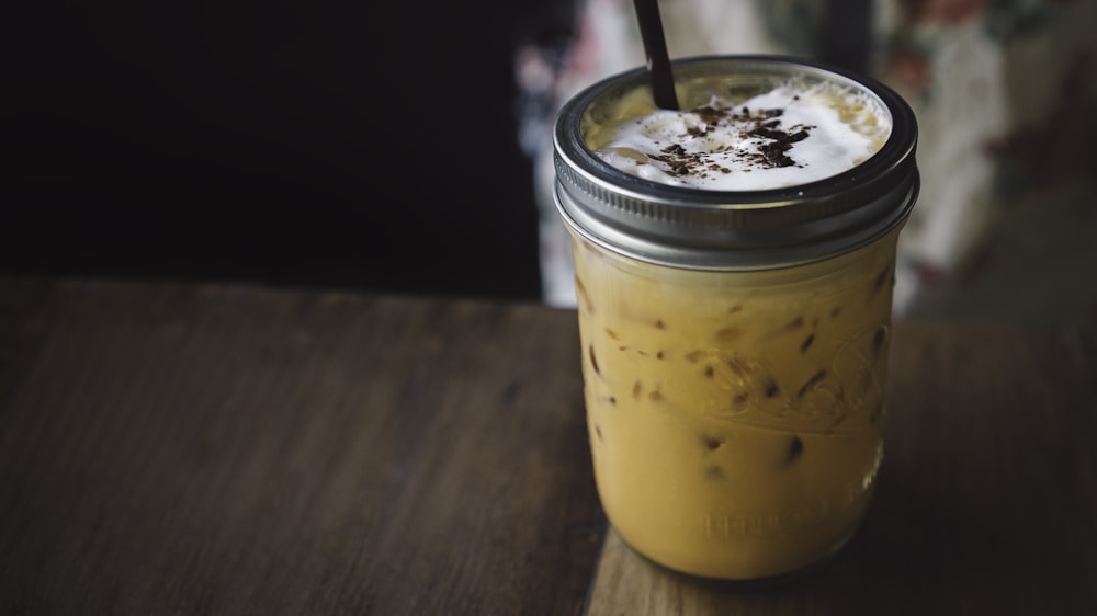 photo of mason jar with straw