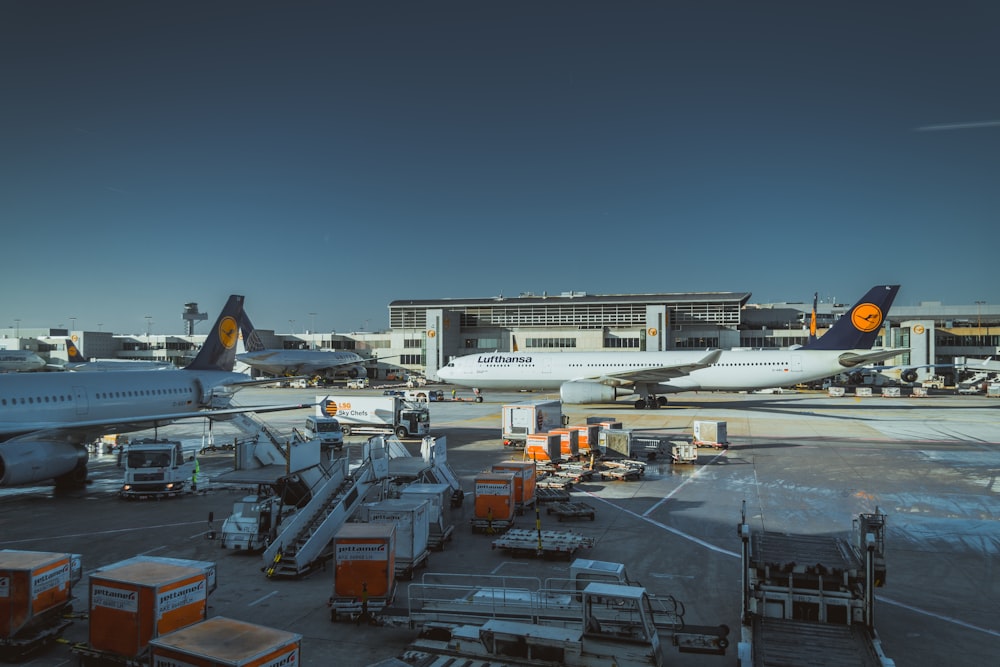 photo of white airliner on port