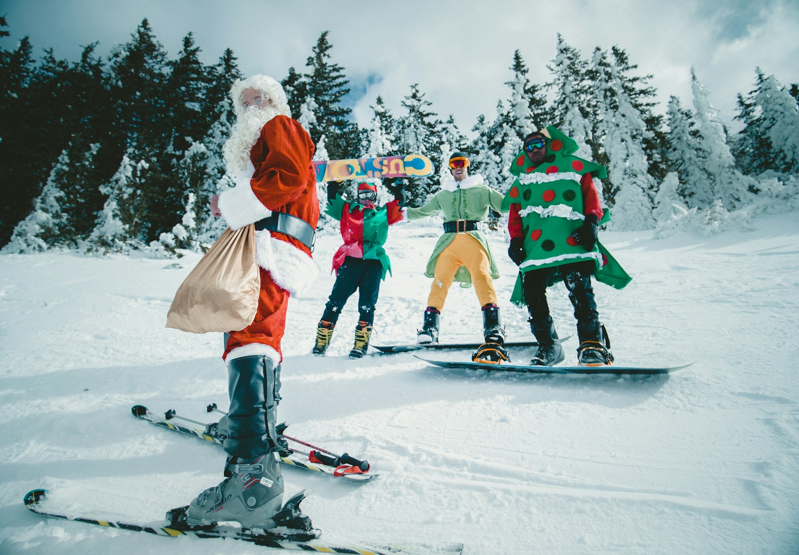 Canon EF 16-35mm F4L IS USM sample photo. Santa claus riding snowboard photography