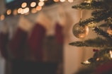 closeup photo of baubles on christmas tree