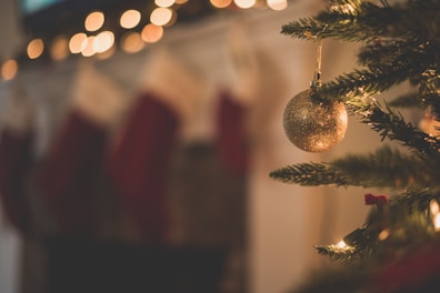 closeup photo of baubles on christmas tree