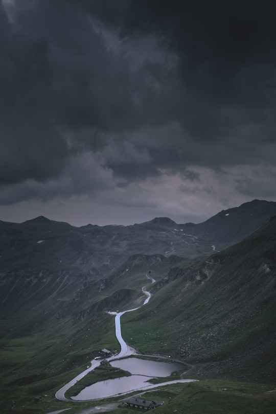 green mountains with body of water on bottom in Grossglockner High Alpine Road Austria