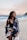 woman wearing monokini and standing on seashore
