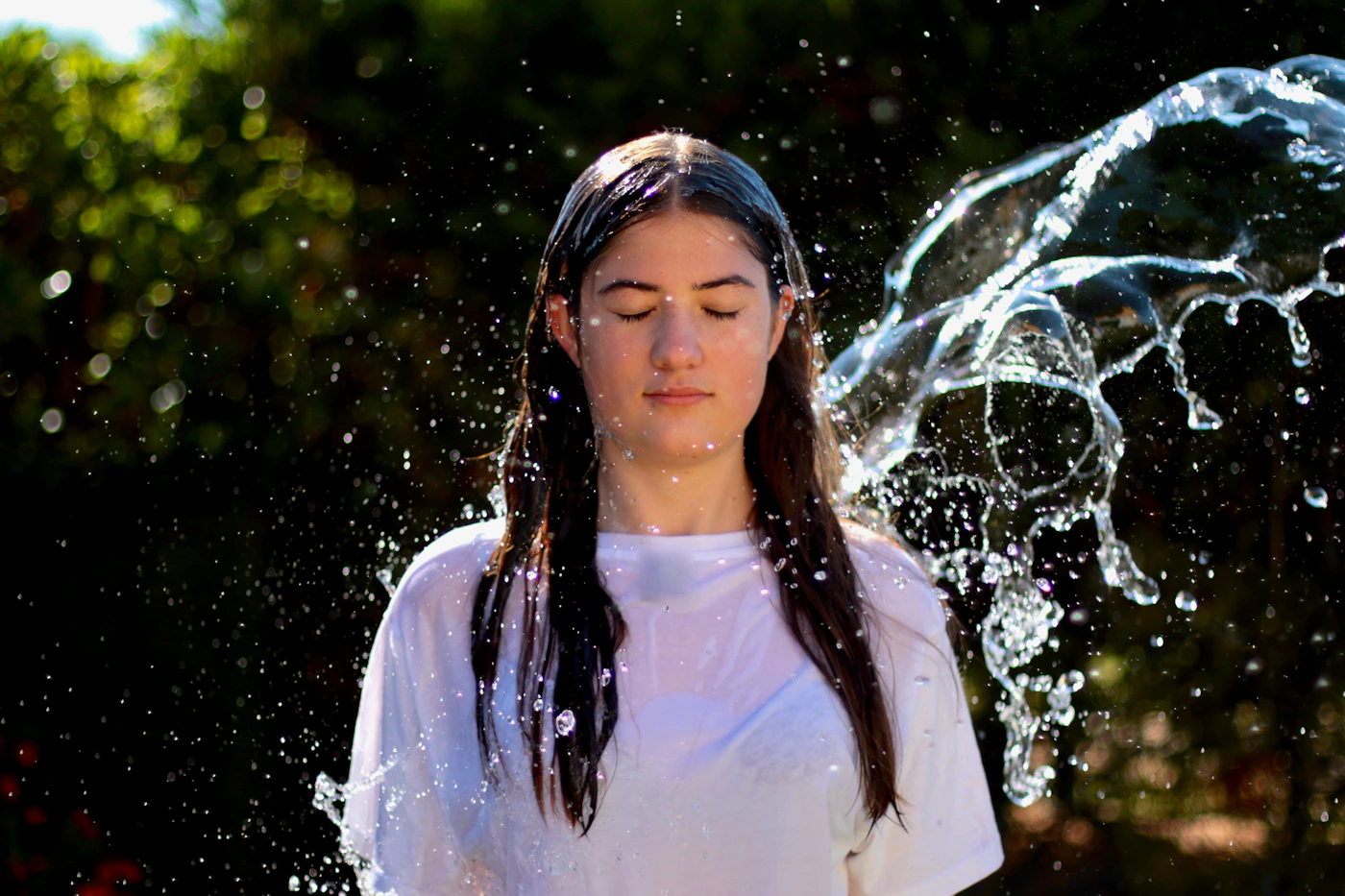 Water gently settling on calm skin, representing skin cooling down after a Post-Laser Soothing Facial session