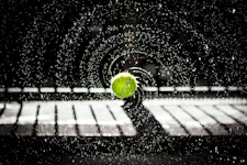 time lapse photo of tennis ball