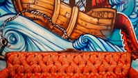 tufted-orange-red-sofa-interior-design