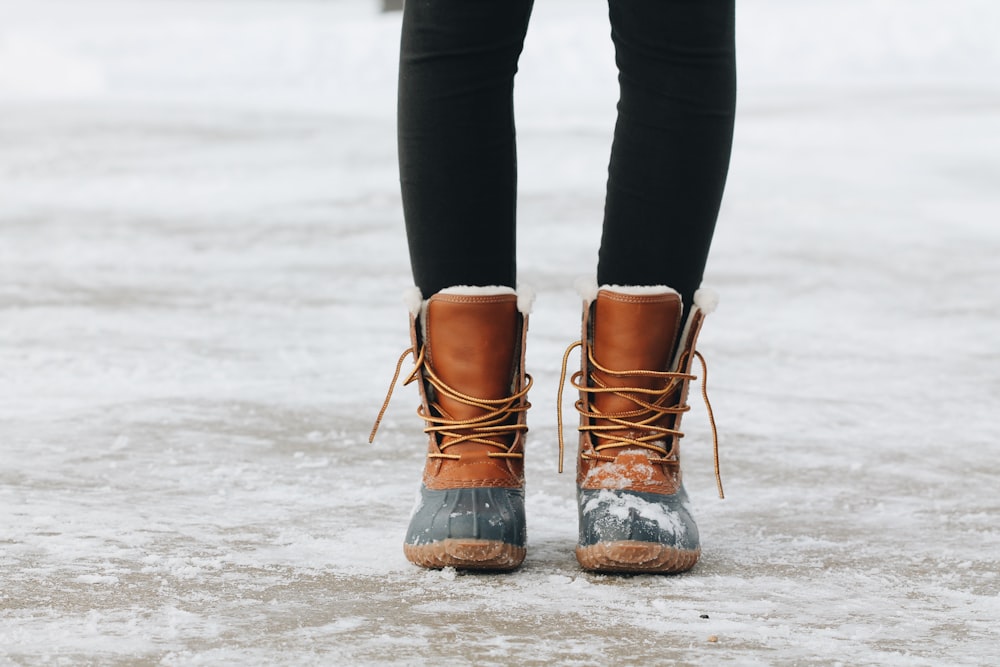 person standing on brown ground