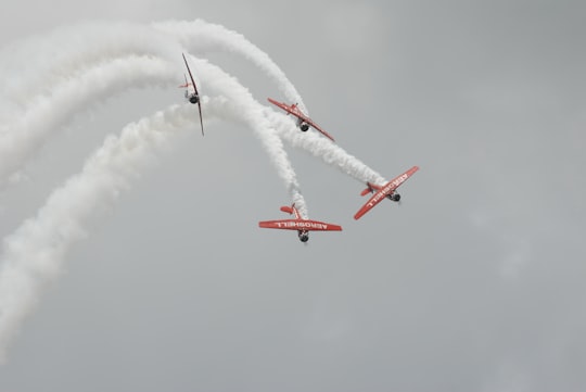 four red biplanes air exhibition in Lakeland Linder Regional Airport United States