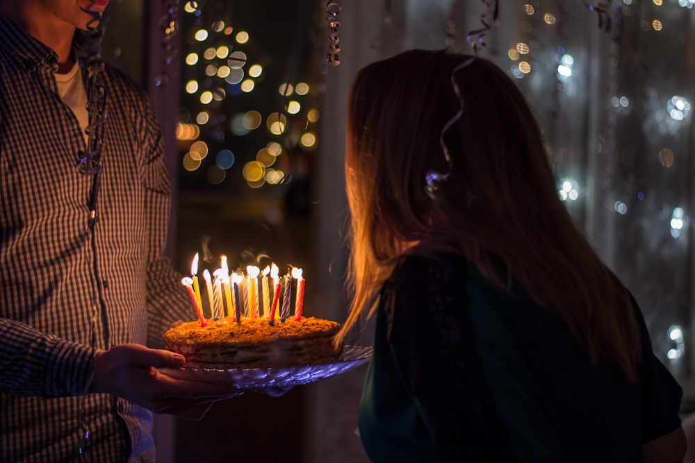 photo of birthday birth about to blow birthday candles