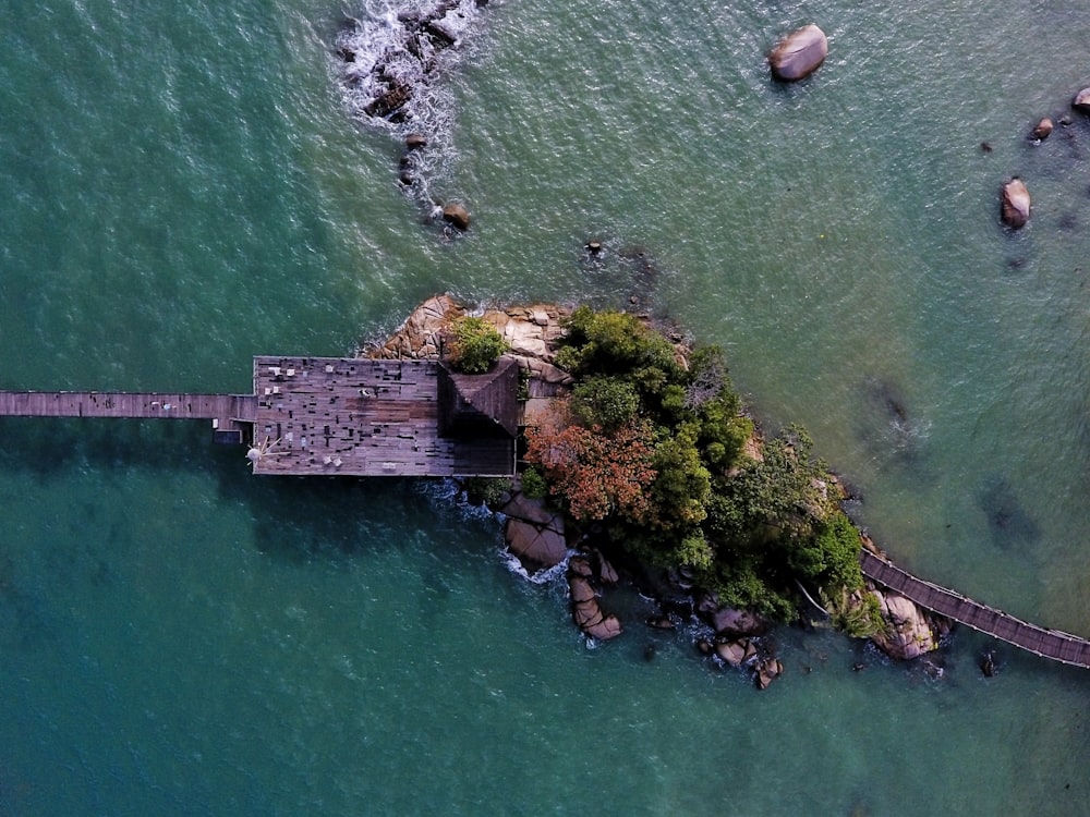 high angle photography of island with sea