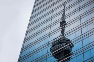 low angle photo of curtain wall building