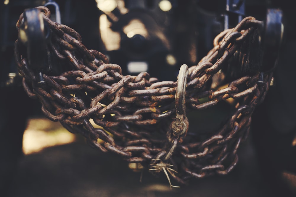 close up photo of brown metal chain