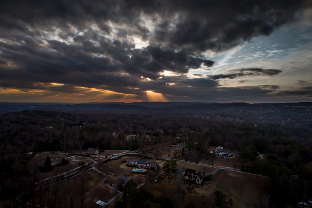 aerial view of rural area under dark clouds