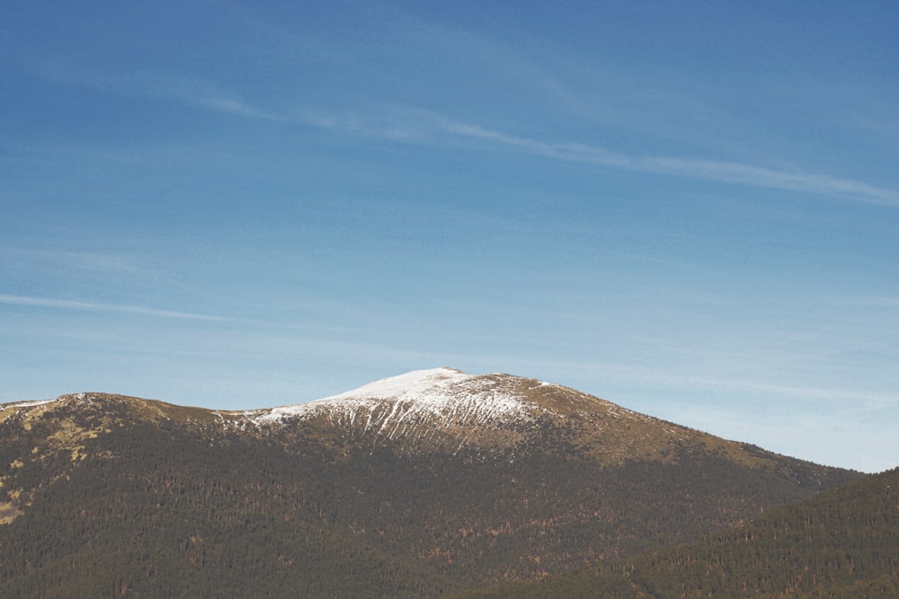 bird's eye view of hill under clear sky