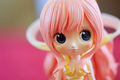 A cheerful nendoroid figure smiling with a playful pose on a white backdrop.