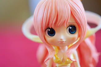 A cheerful nendoroid figure smiling with a playful pose on a white backdrop.
