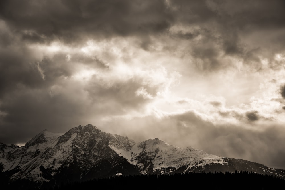 grayscale photography of snow covered mountain