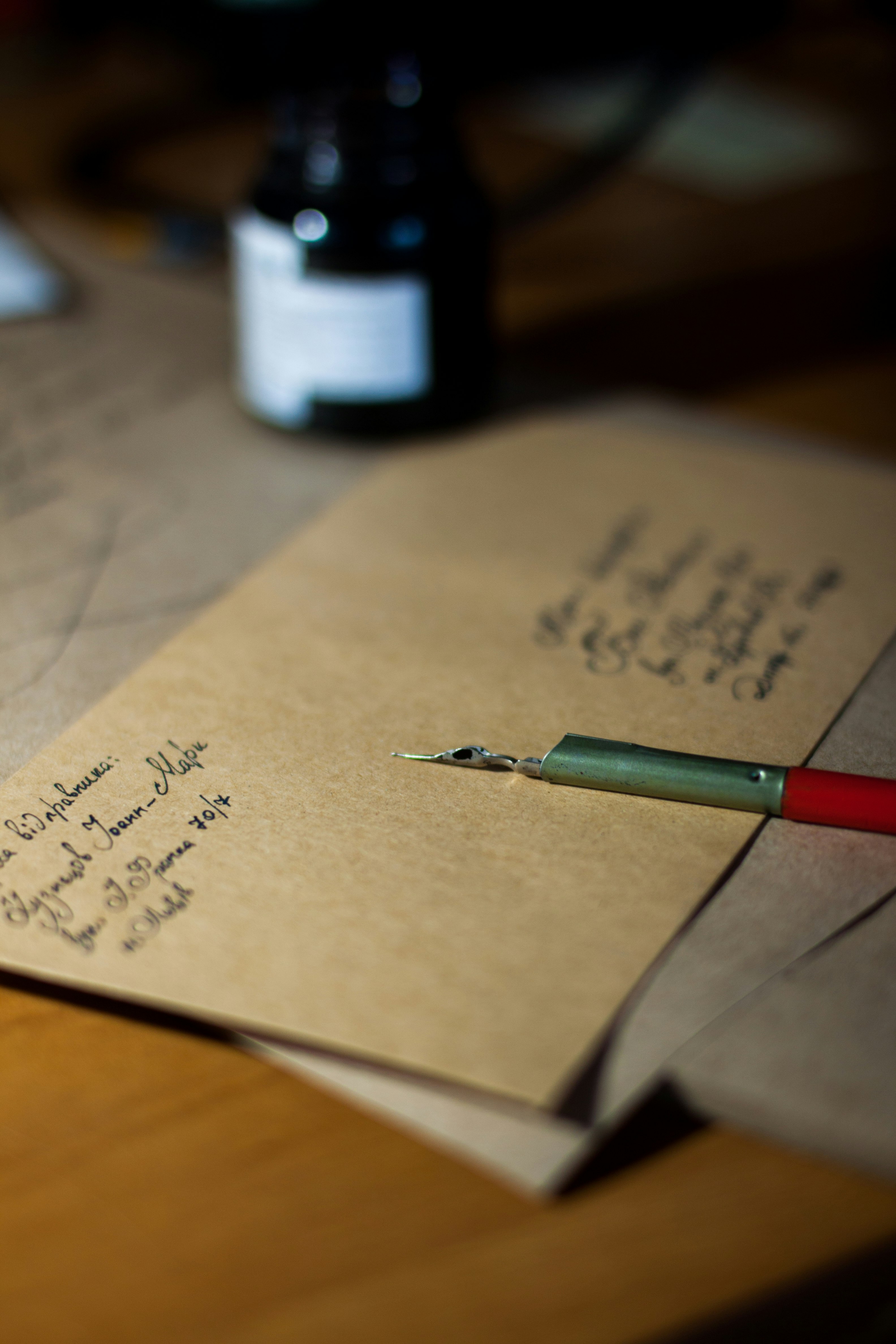 A brown envelope with from and to info written on it.