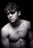 grayscale photo of topless man