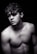 grayscale photo of topless man