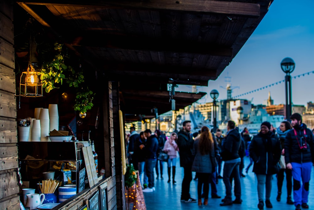 photo of people walking near store