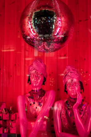 A behind-the-scenes shot of an AI-assisted fashion photoshoot with vibrant jewelry displays.