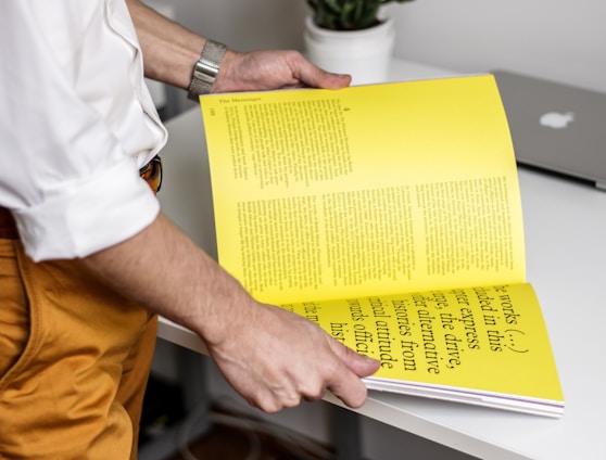 person holding book