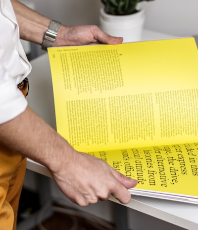 person holding book