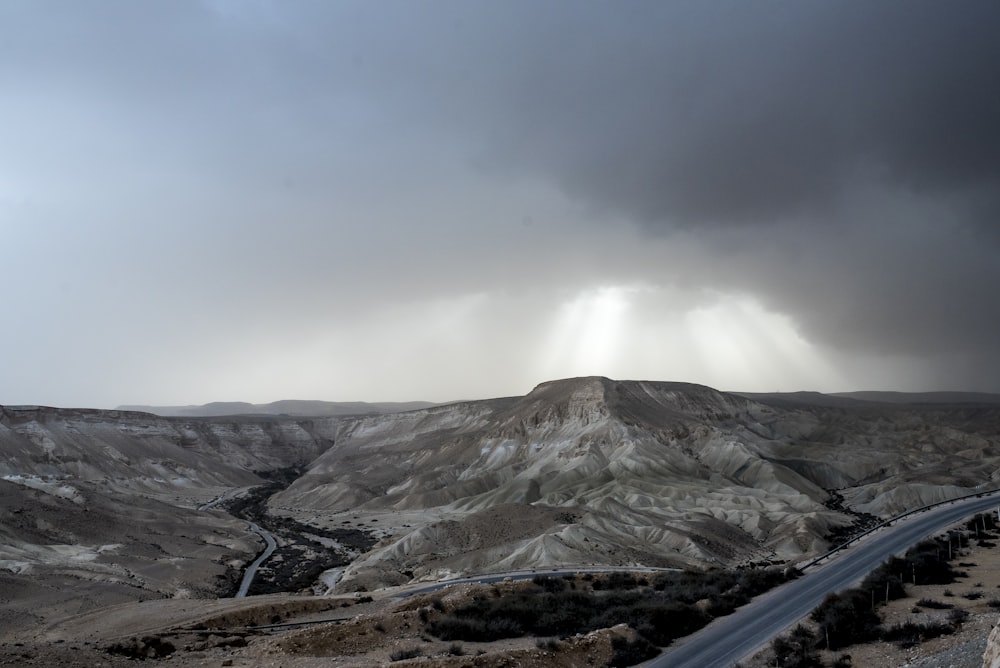 bird's-eye view photography of land with crepuscular rays