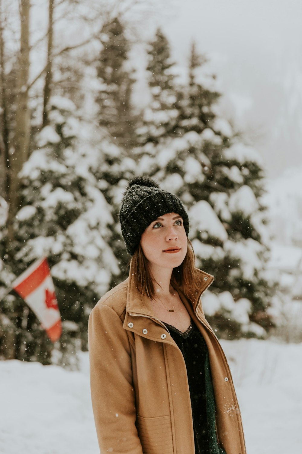 woman standing on snow covered place