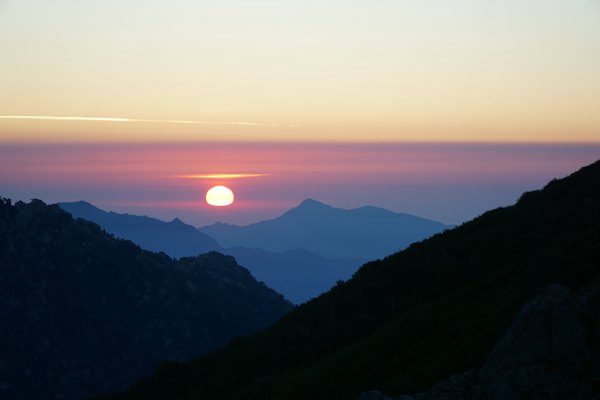 Silhouette of mountains during sunset — Corsica, France