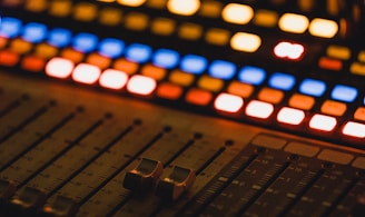 shallow focus photography of audio mixer