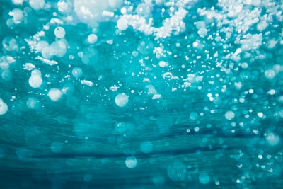 underwater photography of water bubbles water google meet background