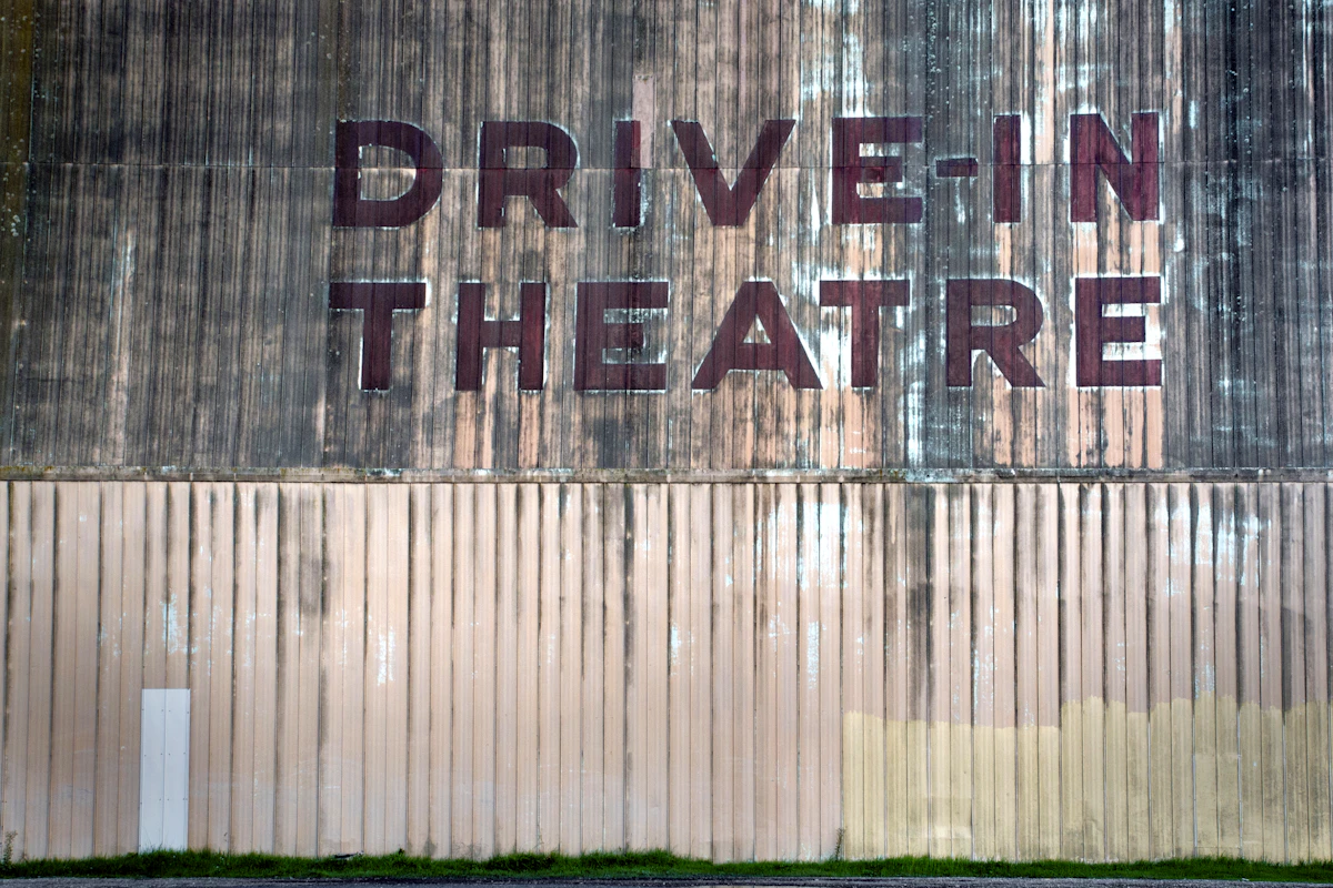 Drive-in theatre signage at dusk