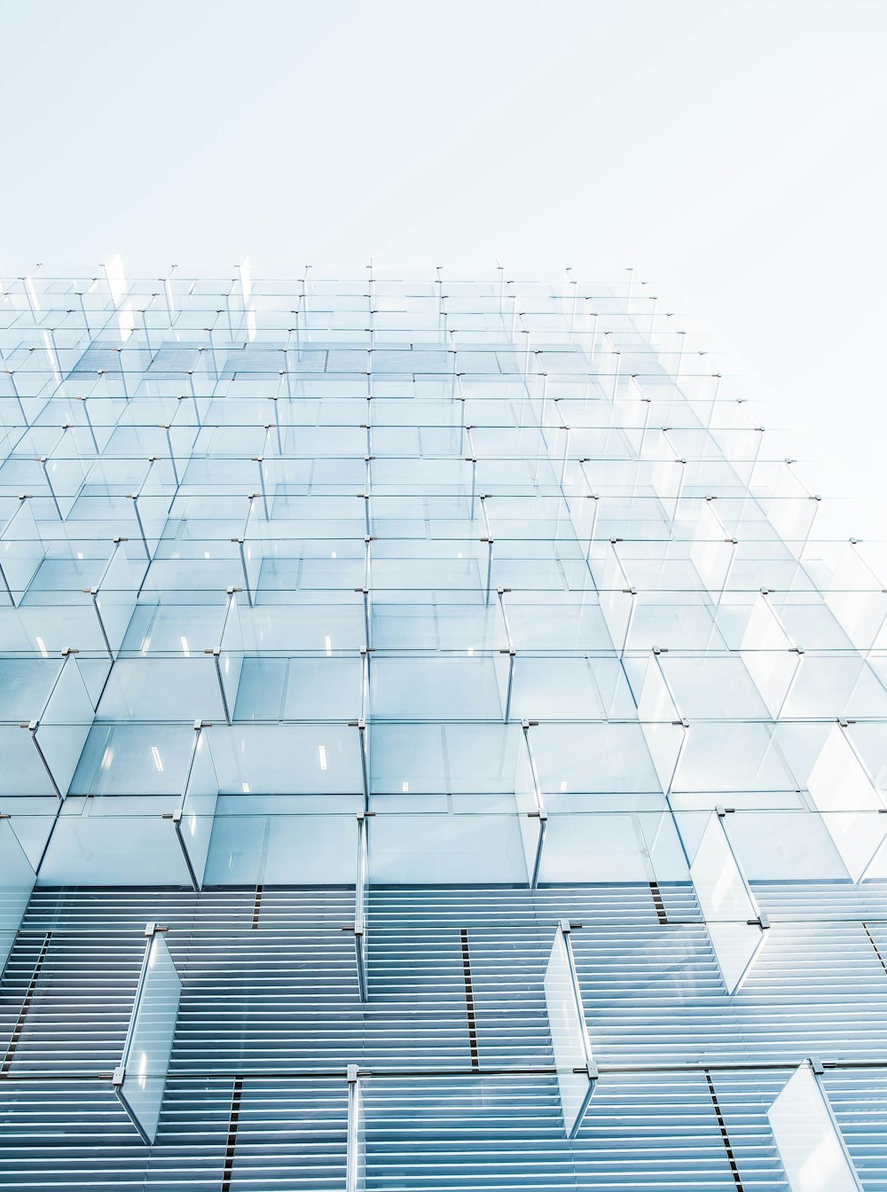 close up photo of clear cubicles against white background