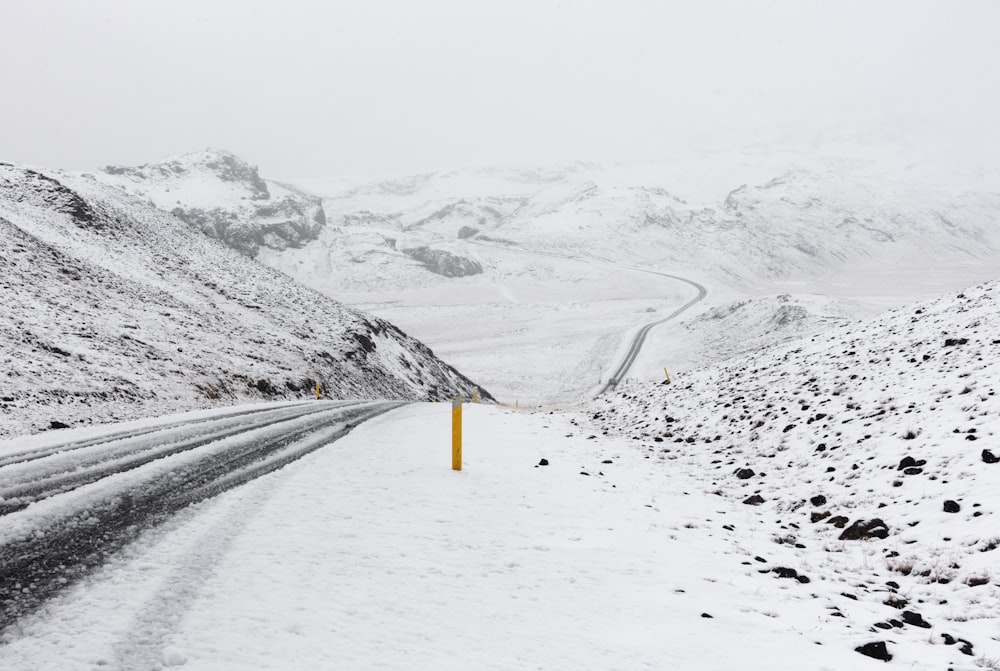 photography of snow covered road