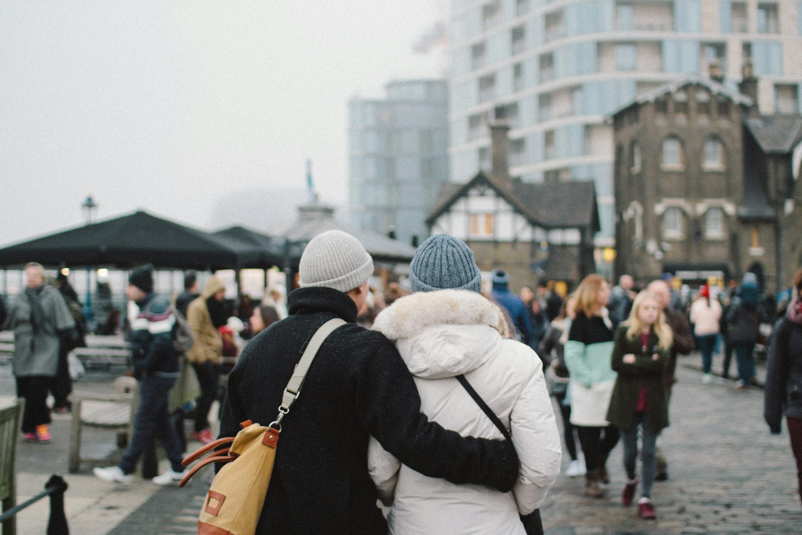 Sigma 30mm f/1.4 DC HSM sample photo. Couple wearing jacket and photography