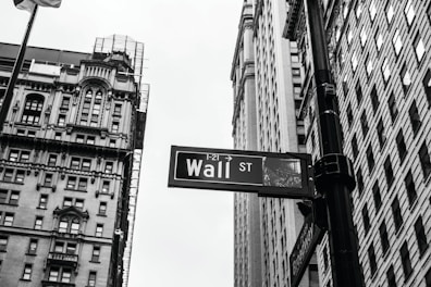 grayscale photo of 1-21 Wall street signage